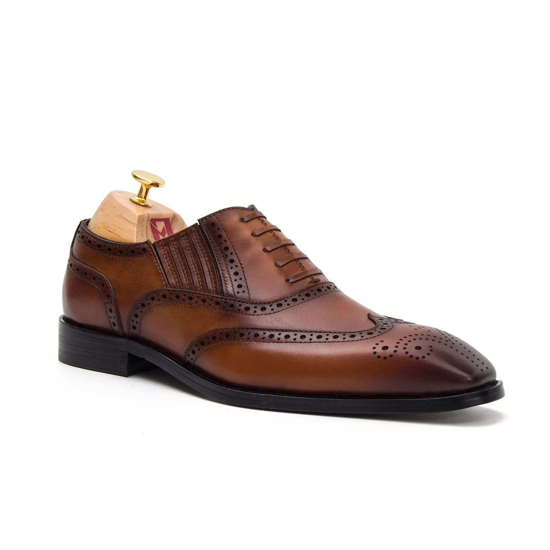 Brown wingtip dress shoes