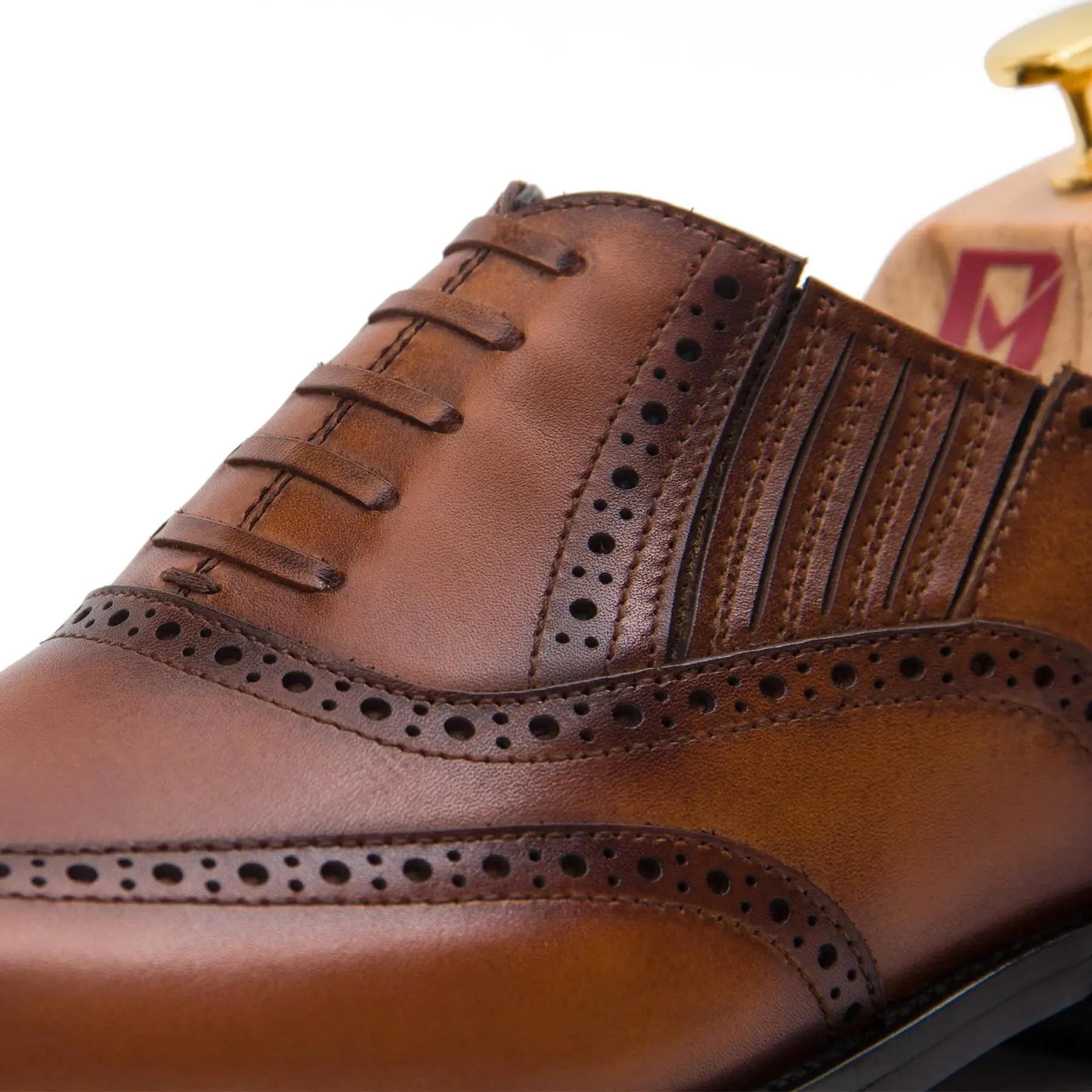 Brown wingtip dress shoes